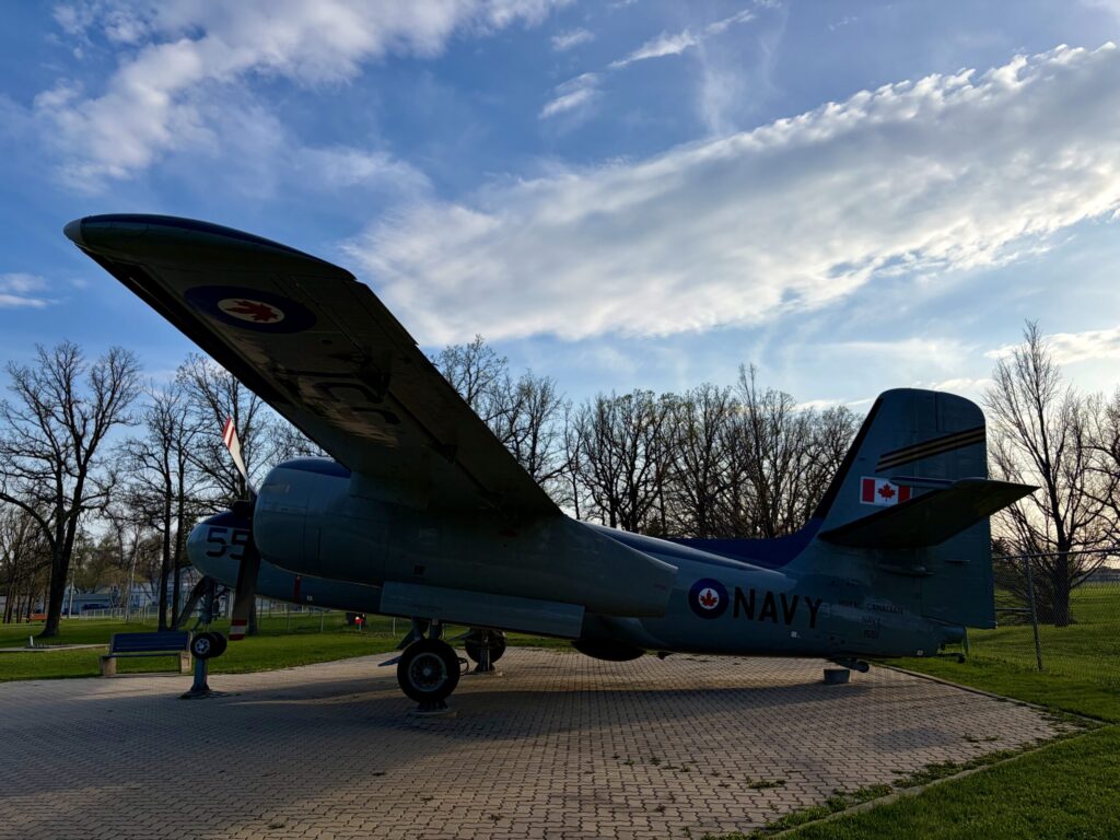 Air Force Heritage Air Park, Winnipeg: Planes, History and Coffee 52 Royal Canadian Navy aircraft on display in a park, a twin-engine transport plane with number 55 on the fuselage and Canadian flag on the tail