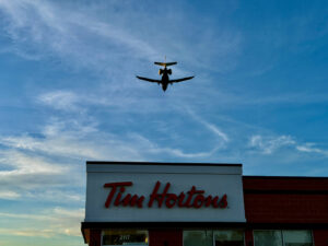 Air Force Heritage Air Park, Winnipeg: Planes, History and Coffee 8 Aircraft flying over a Tim Hortons location